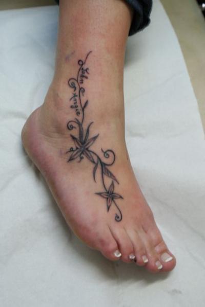 Nos ralisations - Arabesques - Arabesque et fleurs Boutique Tattoo Evolution Perpignan