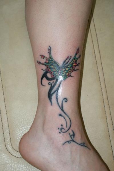 tattoo papillon. tattoo papillon