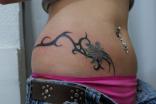 Coup de coeur 5 . Boutique Tattoo Evolution Perpignan - Tatouage fleur avec tribal. TATTOO EVOLUTION (perpignan)